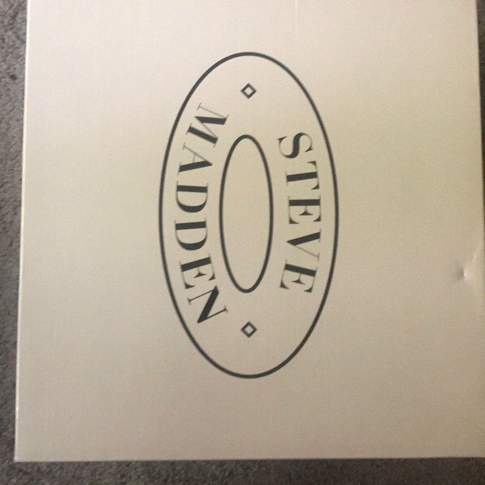 one of a kind Steve Madden tennis shoe heel.